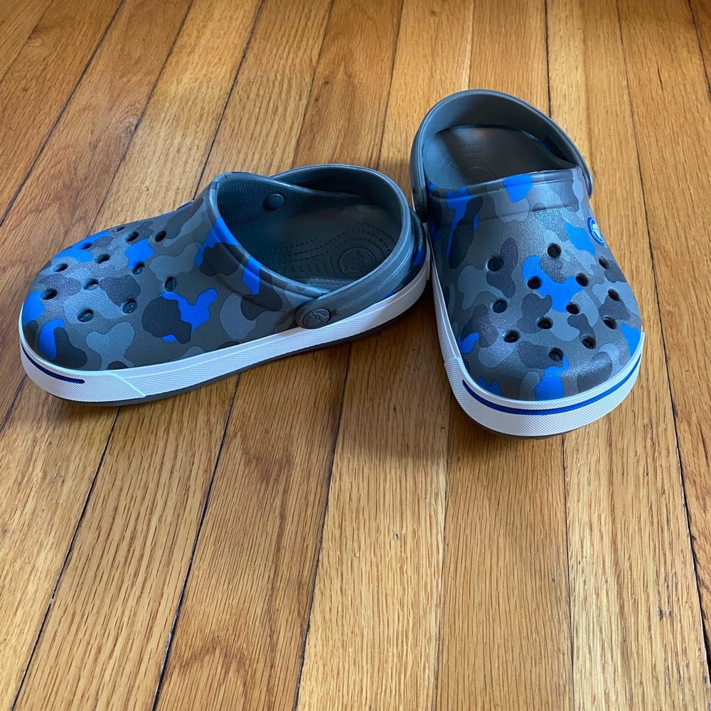 Boys blue camo crocs. NWOT.